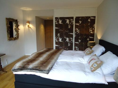 Apartment Humagne - Crans-Montana Center客房内的一张或多张床位