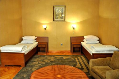 Ganja Hotel客房内的一张或多张床位
