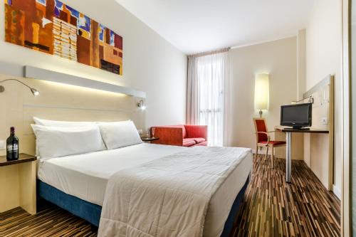 YIT萨拉戈萨酒店客房内的一张或多张床位
