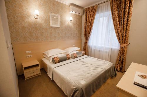 Hotel Teta Kropotkin客房内的一张或多张床位