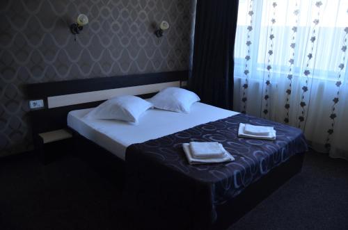 罗伯托别墅酒店客房内的一张或多张床位