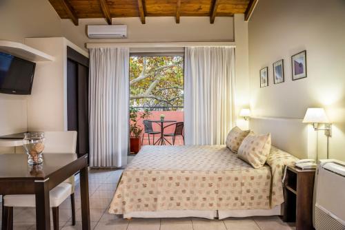 蒙塔纳斯阿祖勒斯公寓式酒店客房内的一张或多张床位