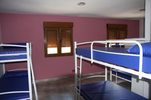 Albergue Outeiro客房内的一张或多张双层床