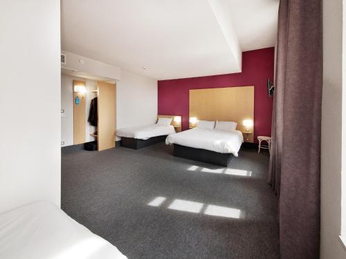 B&B HOTEL Castres Centre Gambetta客房内的一张或多张床位