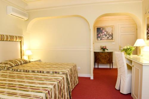 维拉费拉塔公园酒店客房内的一张或多张床位