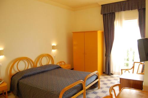 贾迪诺苏马雷酒店客房内的一张或多张床位