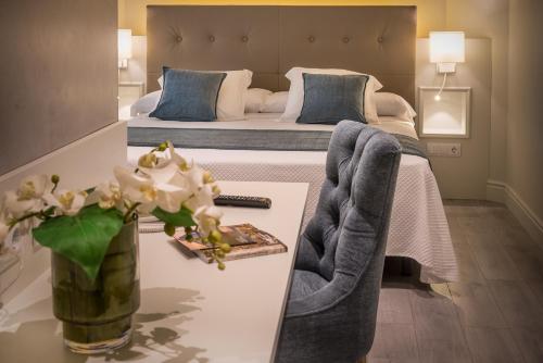比利牛斯山酒店客房内的一张或多张床位