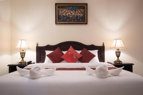 True Siam Rangnam Hotel客房内的一张或多张床位