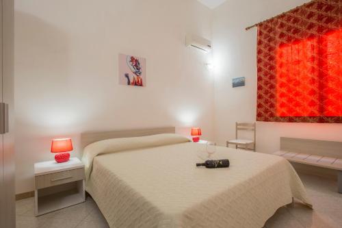 B&B Isole Dello Stagnone客房内的一张或多张床位
