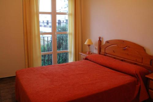 
埃尔米拉多旅馆客房内的一张或多张床位
