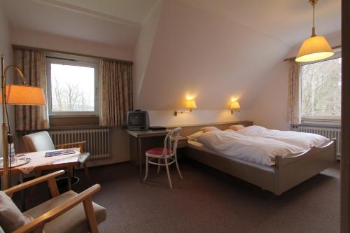 盖斯特豪斯特斯特尔酒店客房内的一张或多张床位