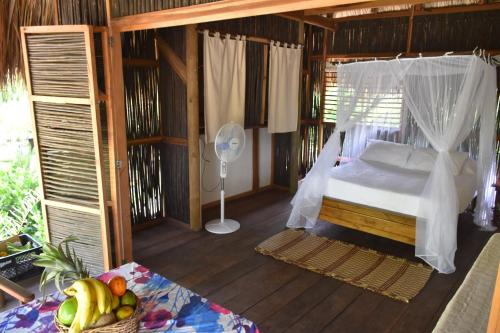 Playa Pikua Ecolodge客房内的一张或多张床位