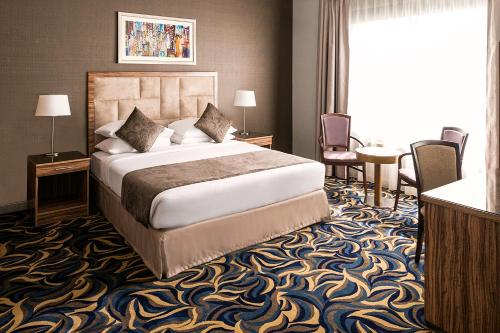 阿联酋广场酒店客房内的一张或多张床位