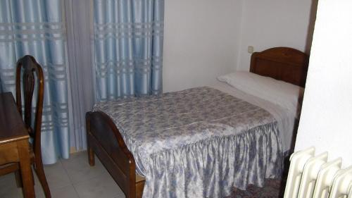 里维埃拉-阿托查旅馆客房内的一张或多张床位