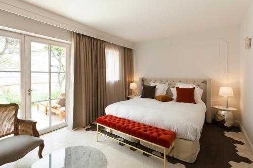 玛斯德埃赫贝斯布兰奇Spa酒店 - 放松&城堡客房内的一张或多张床位