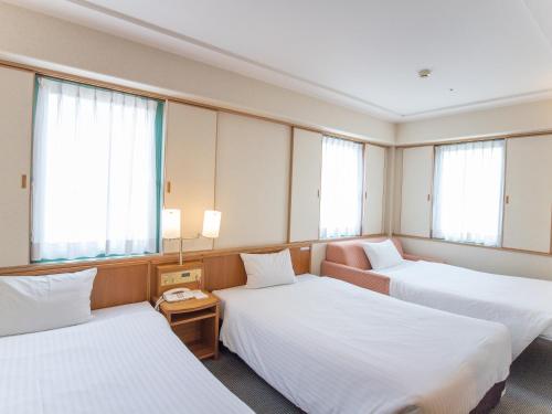 长崎出岛丽景酒店客房内的一张或多张床位