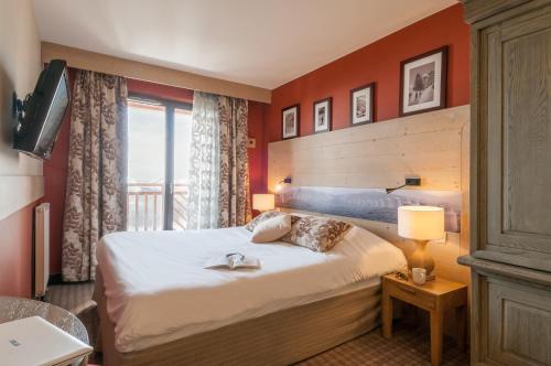阿马拉皮埃尔优品假日公寓酒店客房内的一张或多张床位