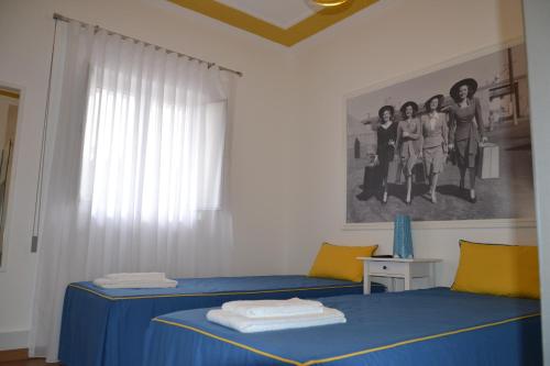 Casa do Ti Luís客房内的一张或多张床位