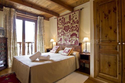 Apartarent La Pleta y Nin Cota 1700客房内的一张或多张床位
