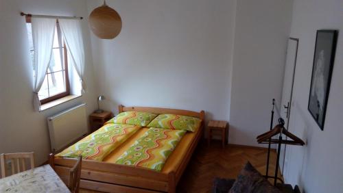 Apartmány Vrchlabí客房内的一张或多张床位