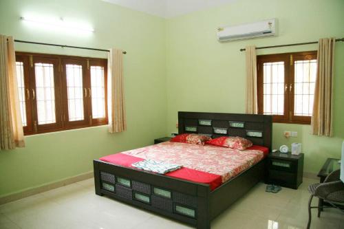KD's Villa - North Goa客房内的一张或多张床位