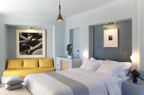 沃雷纳画廊套房酒店客房内的一张或多张床位