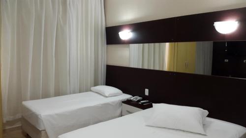 Hotel Monte Libano客房内的一张或多张床位