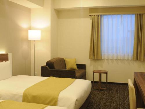 熊谷駅前阳路酒店客房内的一张或多张床位