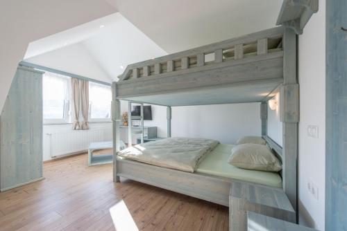 Guesthouse Tolc客房内的一张或多张双层床