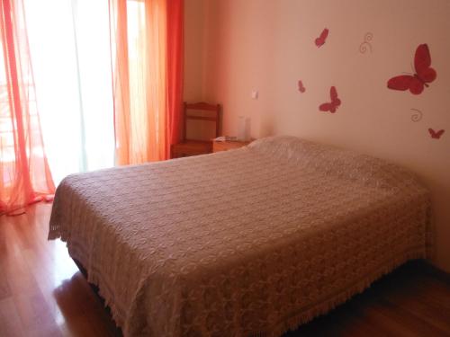 Rooms_Heart Apartment客房内的一张或多张床位