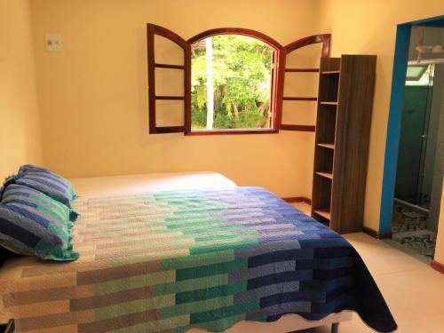 Pousada Paraíso de Itaúna客房内的一张或多张床位