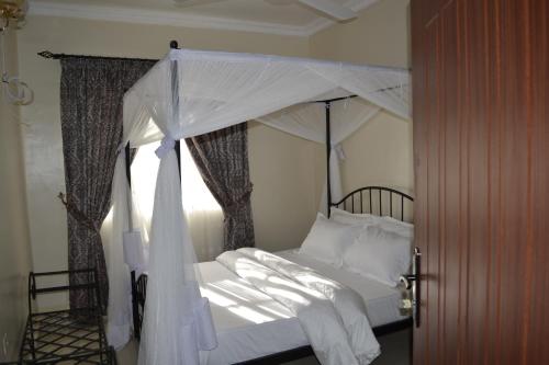 Zakinn Hotel Gangilonga客房内的一张或多张床位