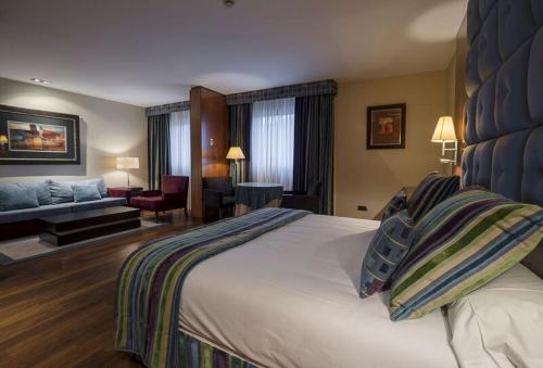 Hospedium Hotel Mirador de Gredos客房内的一张或多张床位