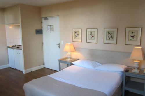 拉泽内城堡 - 公寓酒店客房内的一张或多张床位