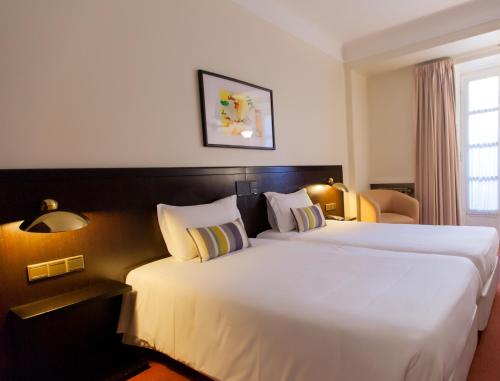 森霍拉布兰卡酒店客房内的一张或多张床位