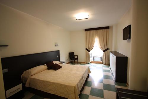 巴尼阿尔科巴里诺酒店客房内的一张或多张床位