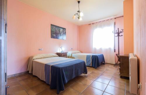 Alojamiento Rural Sierra de Castril客房内的一张或多张床位