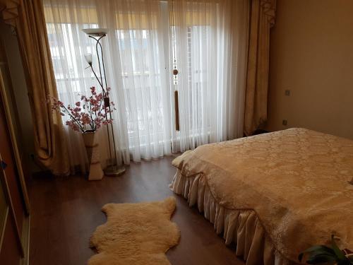Riga airport Apartment客房内的一张或多张床位