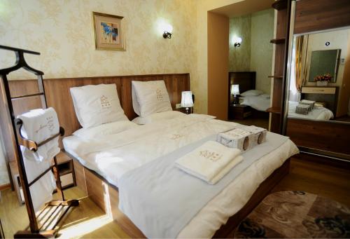 萨纳皮罗第比利斯酒店客房内的一张或多张床位