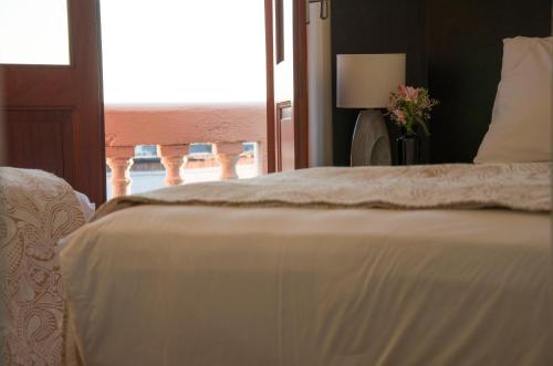 Dolores Hotel - Uruguay客房内的一张或多张床位