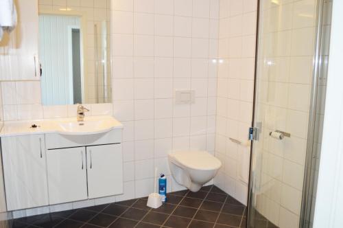 Sula Rorbuer og Havhotell的一间浴室