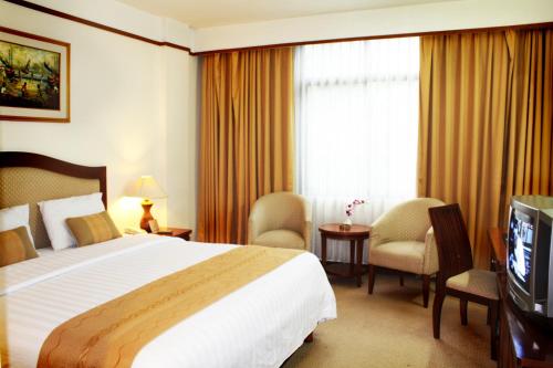 巴孙丹会议大酒店客房内的一张或多张床位