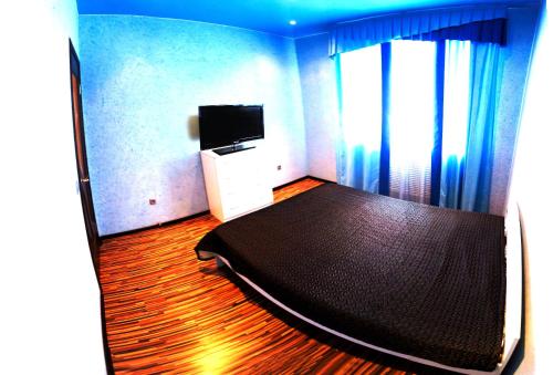 2-rooms Apartment on Shirotnaya客房内的一张或多张床位