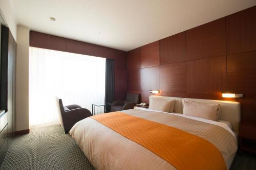 格朗米蕾奇酒店客房内的一张或多张床位