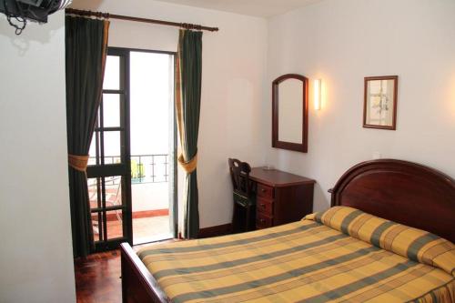 Residencial Santo António客房内的一张或多张床位
