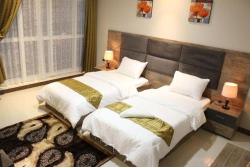 Aris Furnished Apartments客房内的一张或多张床位