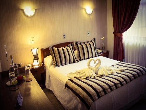 Hotel Royal Victoria客房内的一张或多张床位