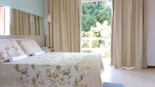 Villas do Pratagy Acerola客房内的一张或多张床位