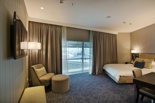安白萨达酒店 - 3号航站楼客房内的一张或多张床位
