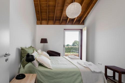 Quinta da Tilia Boutique Retreat客房内的一张或多张床位